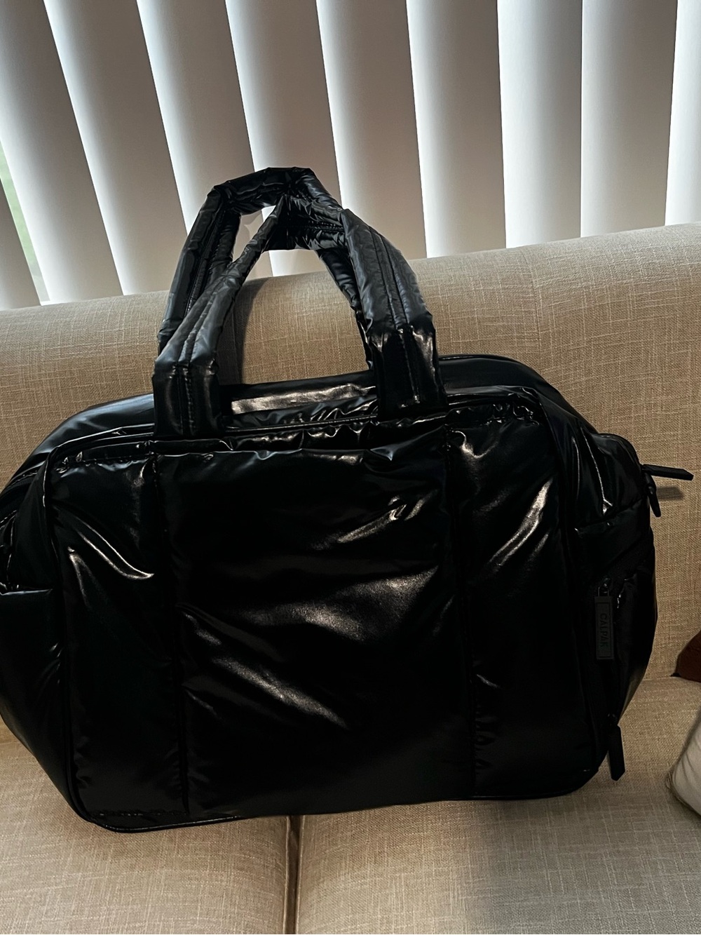 Calpak Black Quilted Puffer Duffel Bag